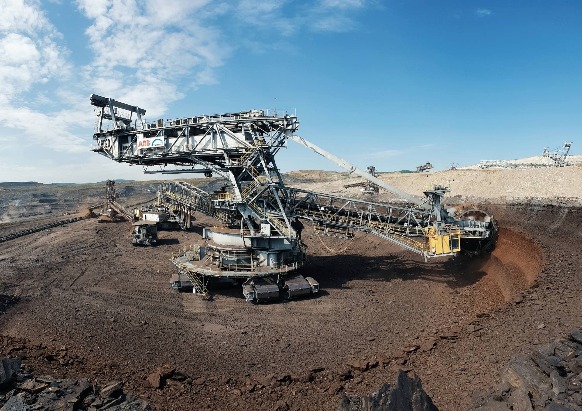 Bucket-wheel excavator working an open-pit mine